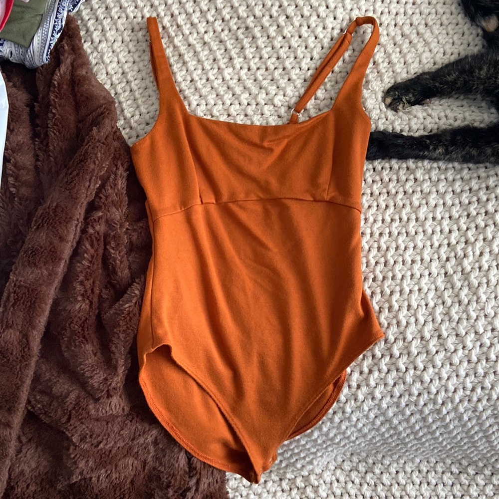 Burnt orange bodysuit